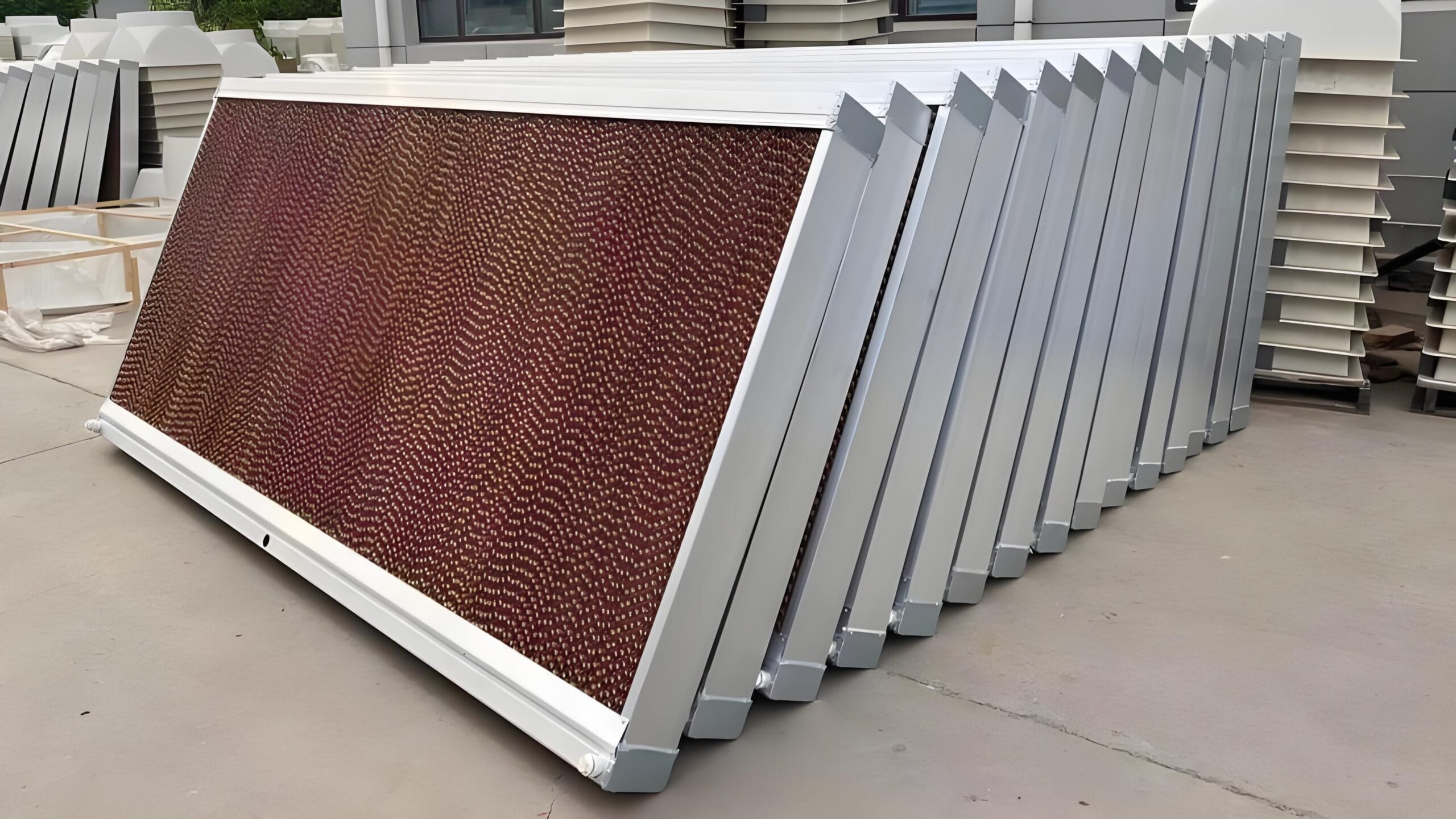 Heavy-duty evaporative cooling pad wall with aluminum frames in tunnel-ventilated poultry house